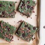 mint cookie bars on a baking sheet