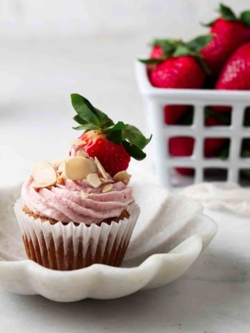 strawberry cupcake with a strawberry on top