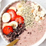 close up strawberry banana smoothie bowl