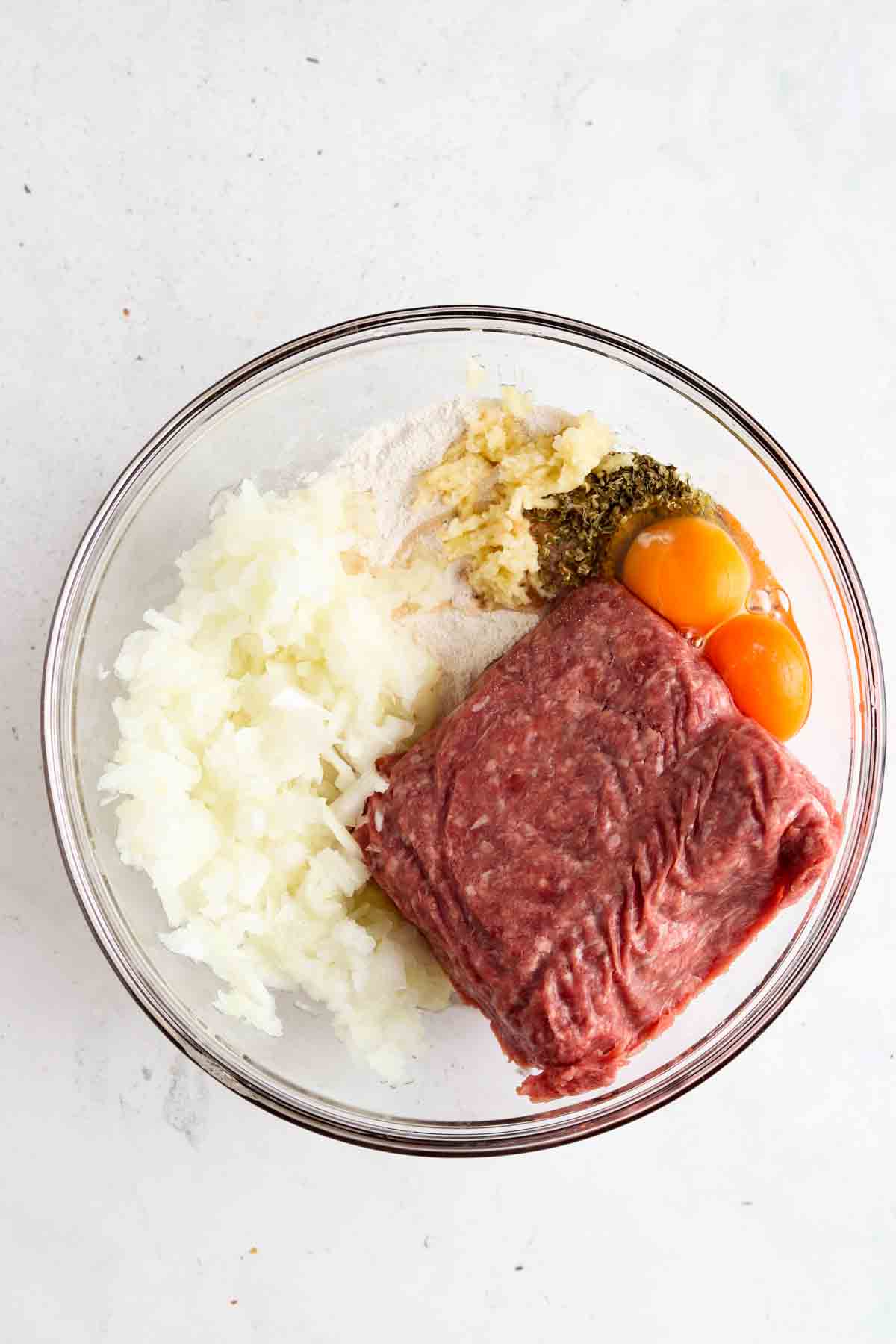 All ingredients laid in a clear bowl.