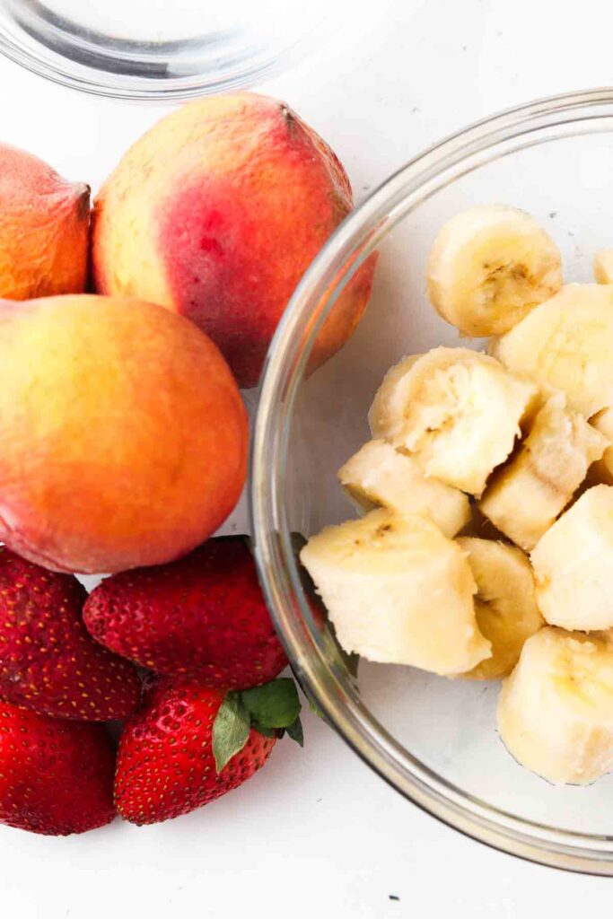 peach freeze pop ingredients laid out in bowls