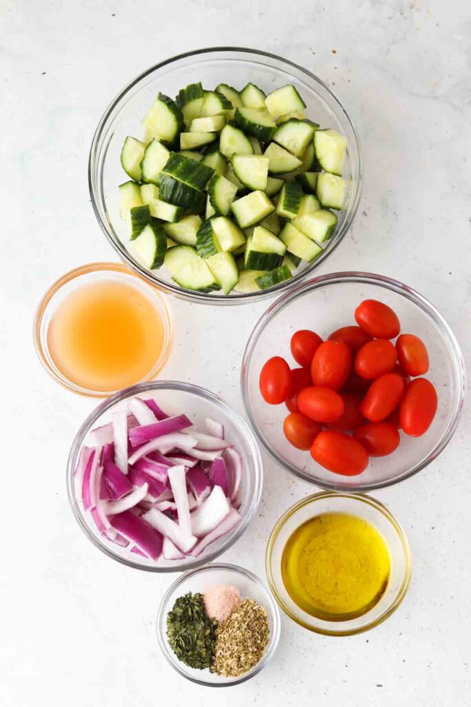 paleo greek salad ingredients in bowls