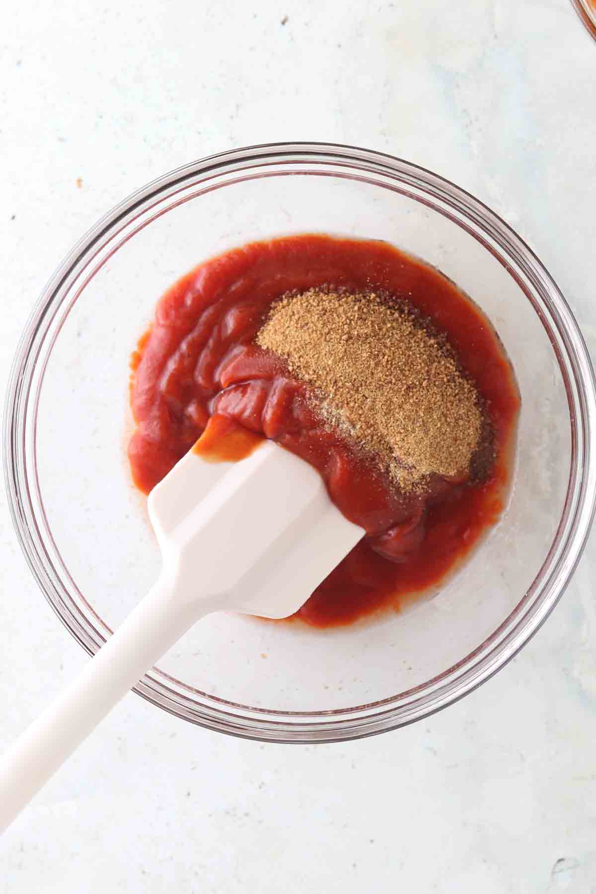 Meatloaf glaze ingredients in a glass bowl.