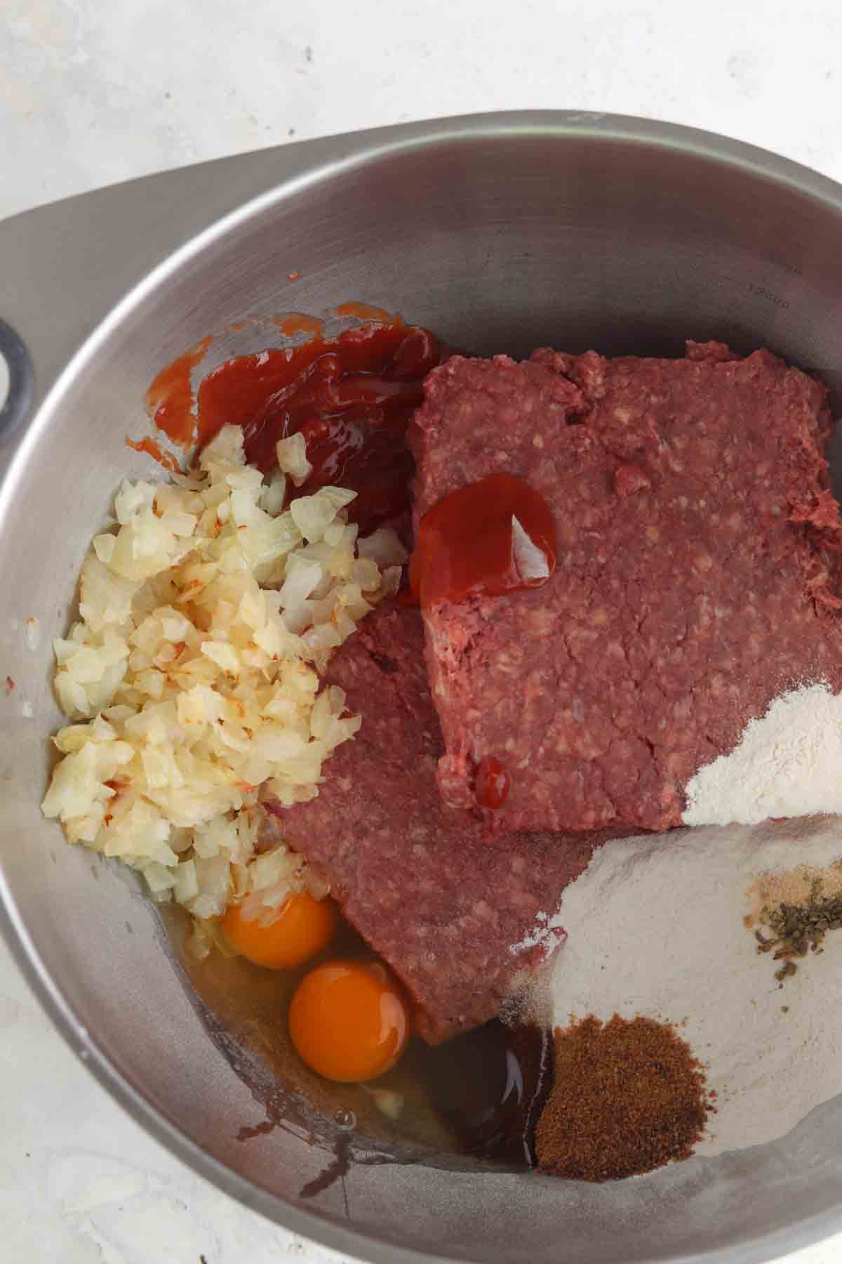 Meatloaf ingredients in a large bowl.