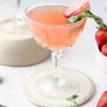 side shot of rhubarb in a glass with club soda