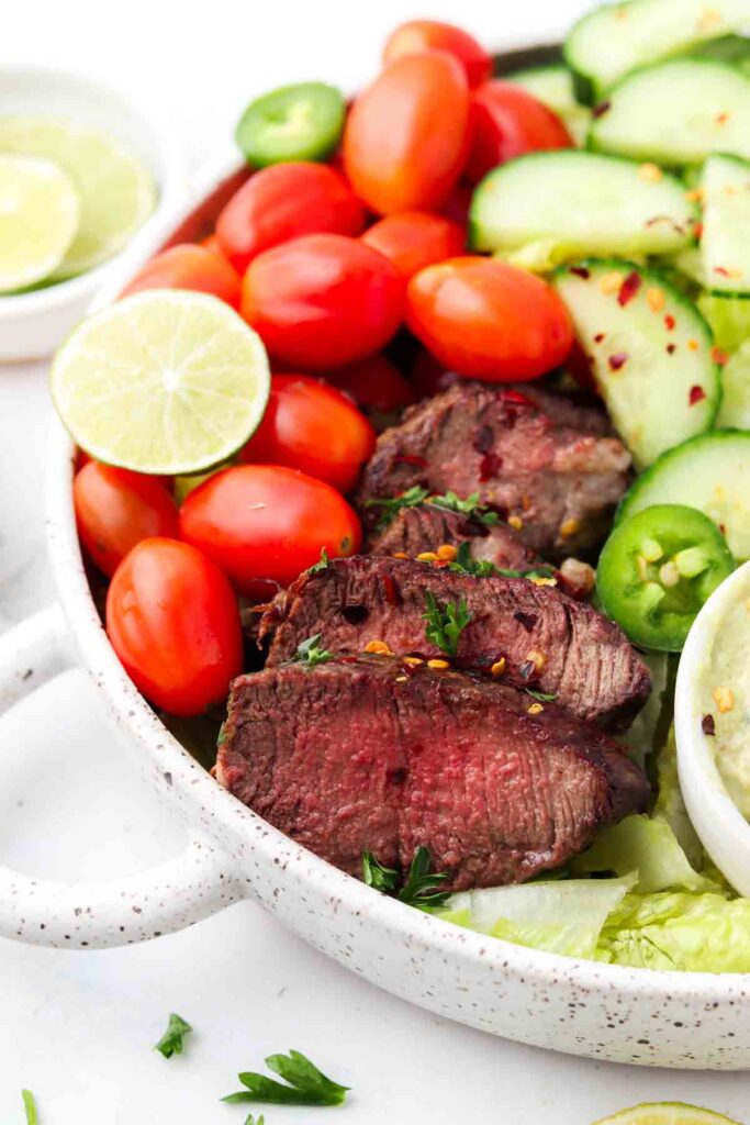 side angle view of a steak taco salad