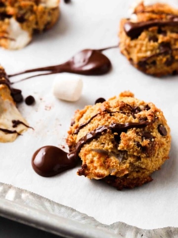 s'mores cookies made with gluten free flour with chocolate drizzled on top