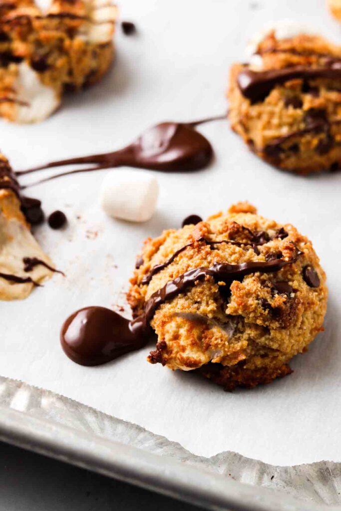 s'mores cookies made with gluten free flour with chocolate drizzled on top