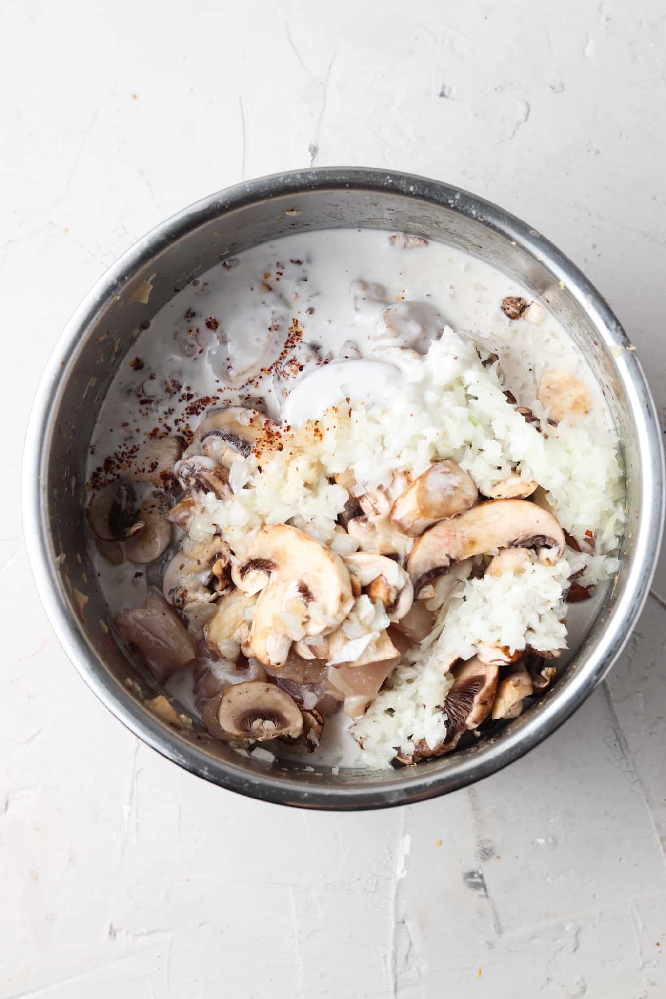 Thai Creamy Chicken soup ingredients in a stock pot. 