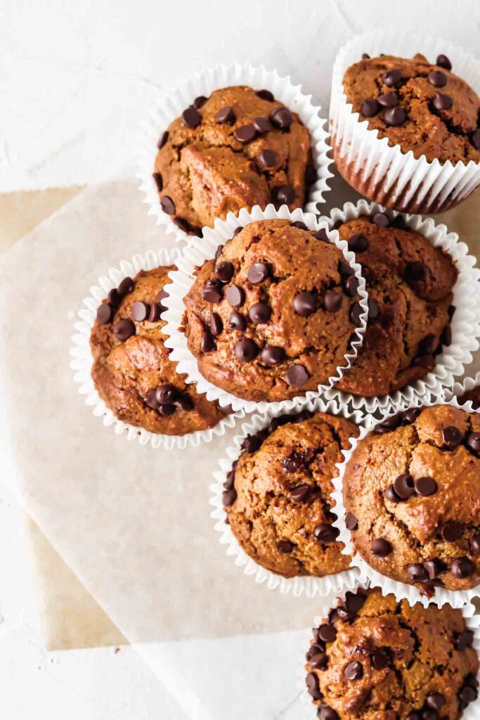 gluten free banana muffins stacked on top of each other 