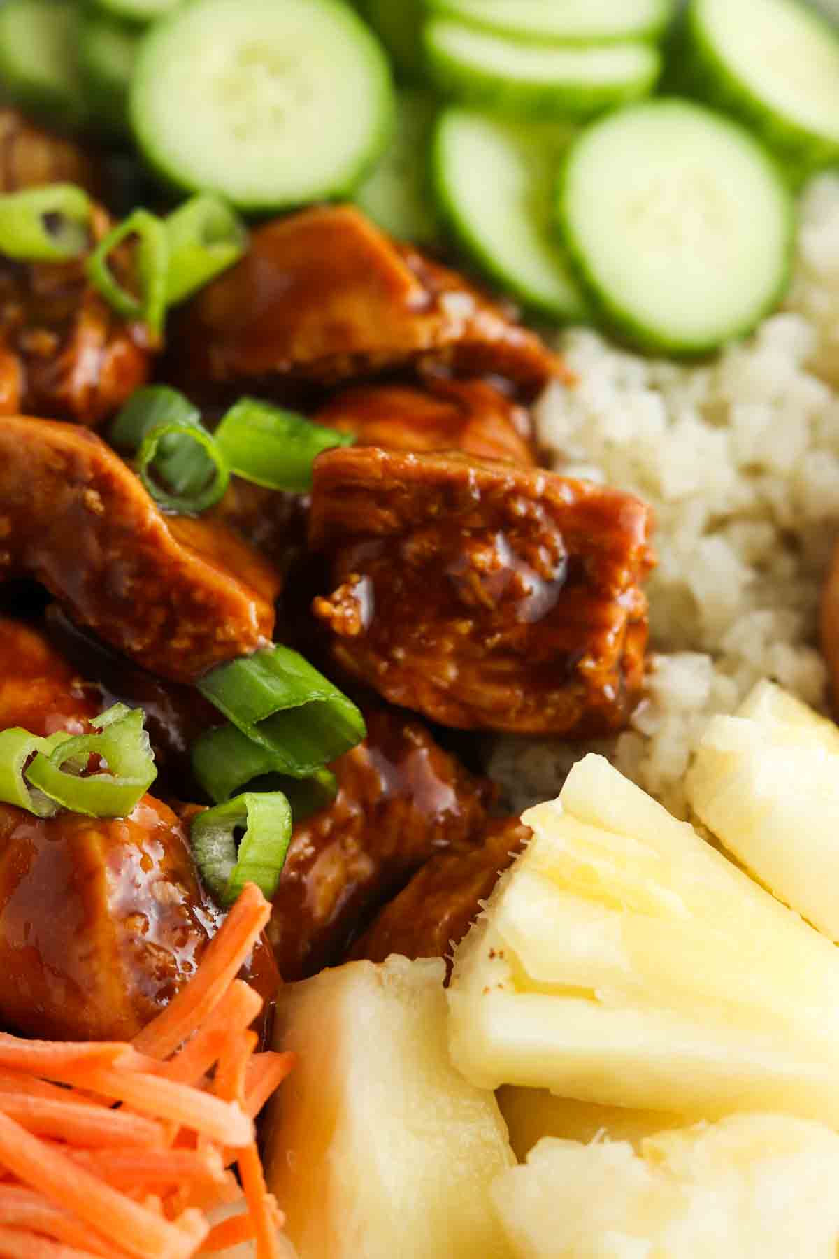 Marinated chicken, green onions, cucumbers, cauliflower rice and carrots all tossed together.