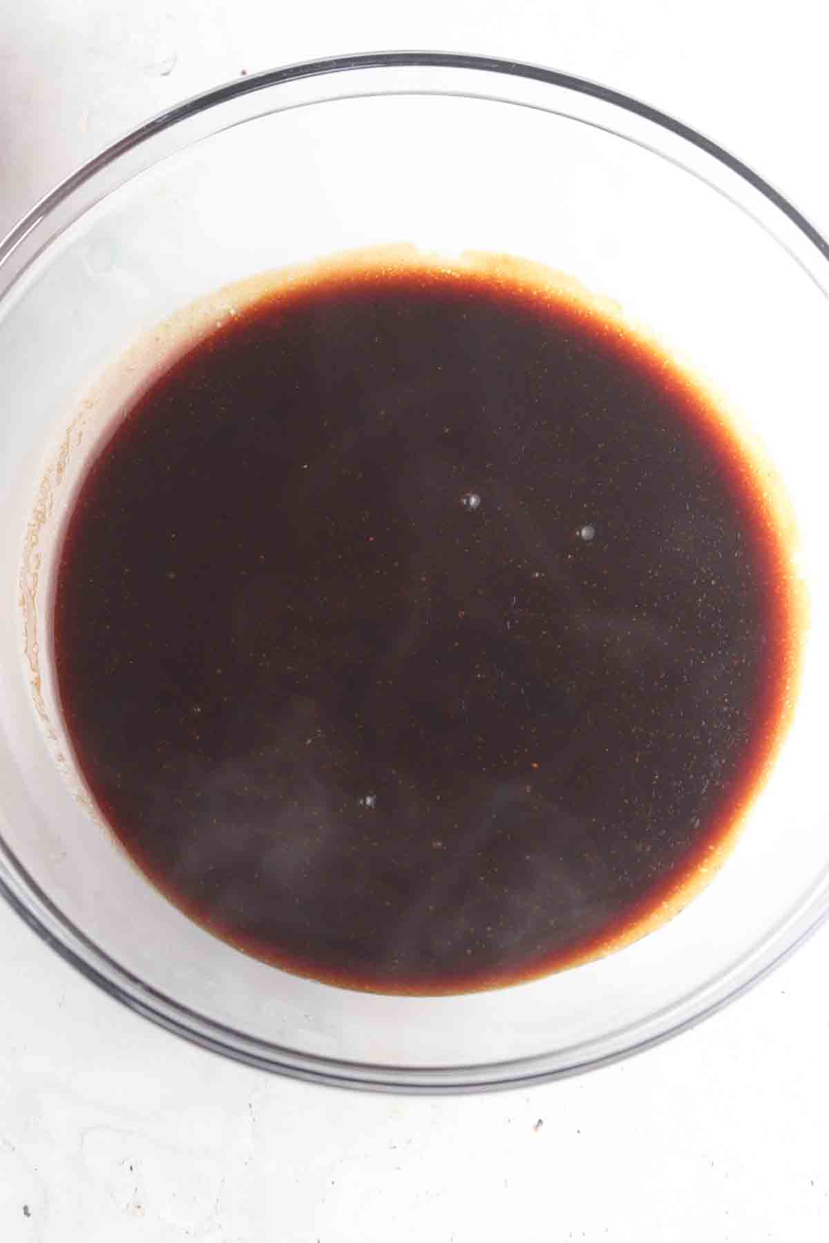 Chicken poke marinate in a large bowl. 