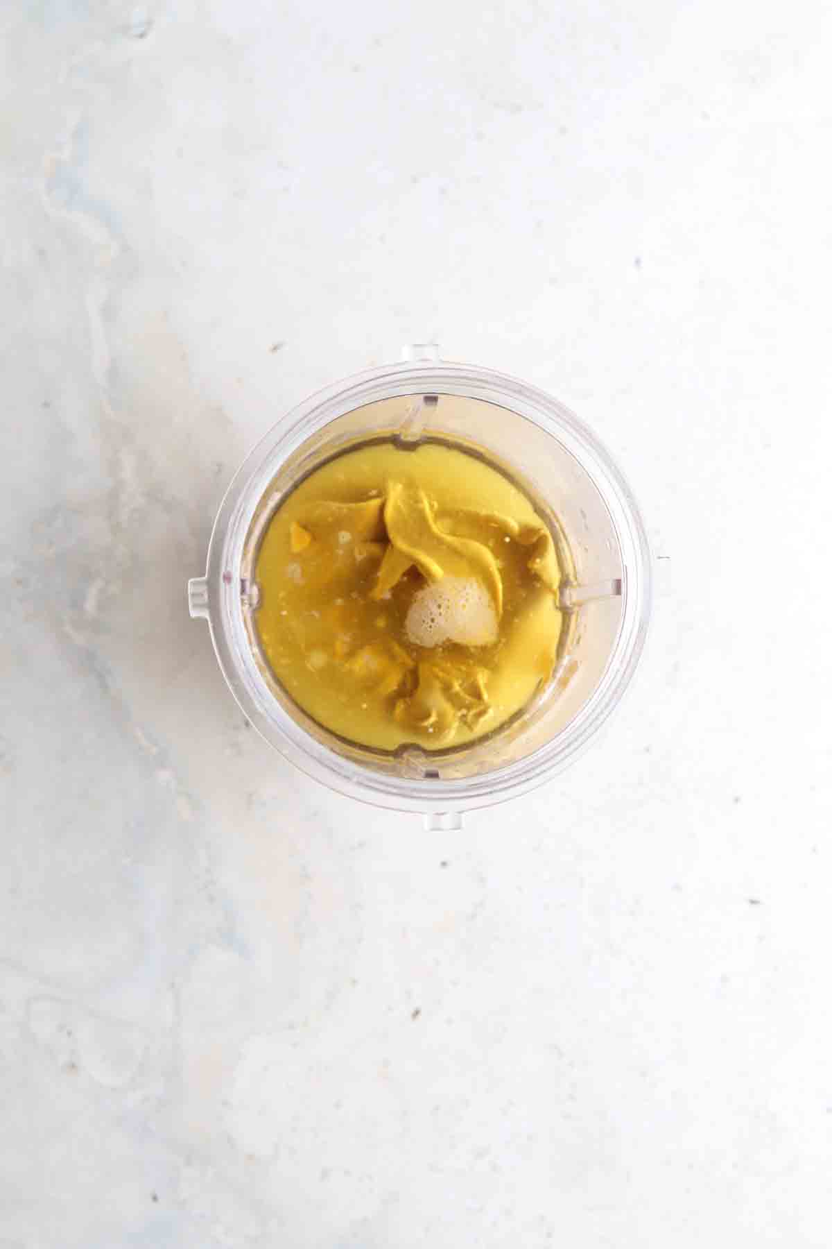 Dijon dressing in the food processor.