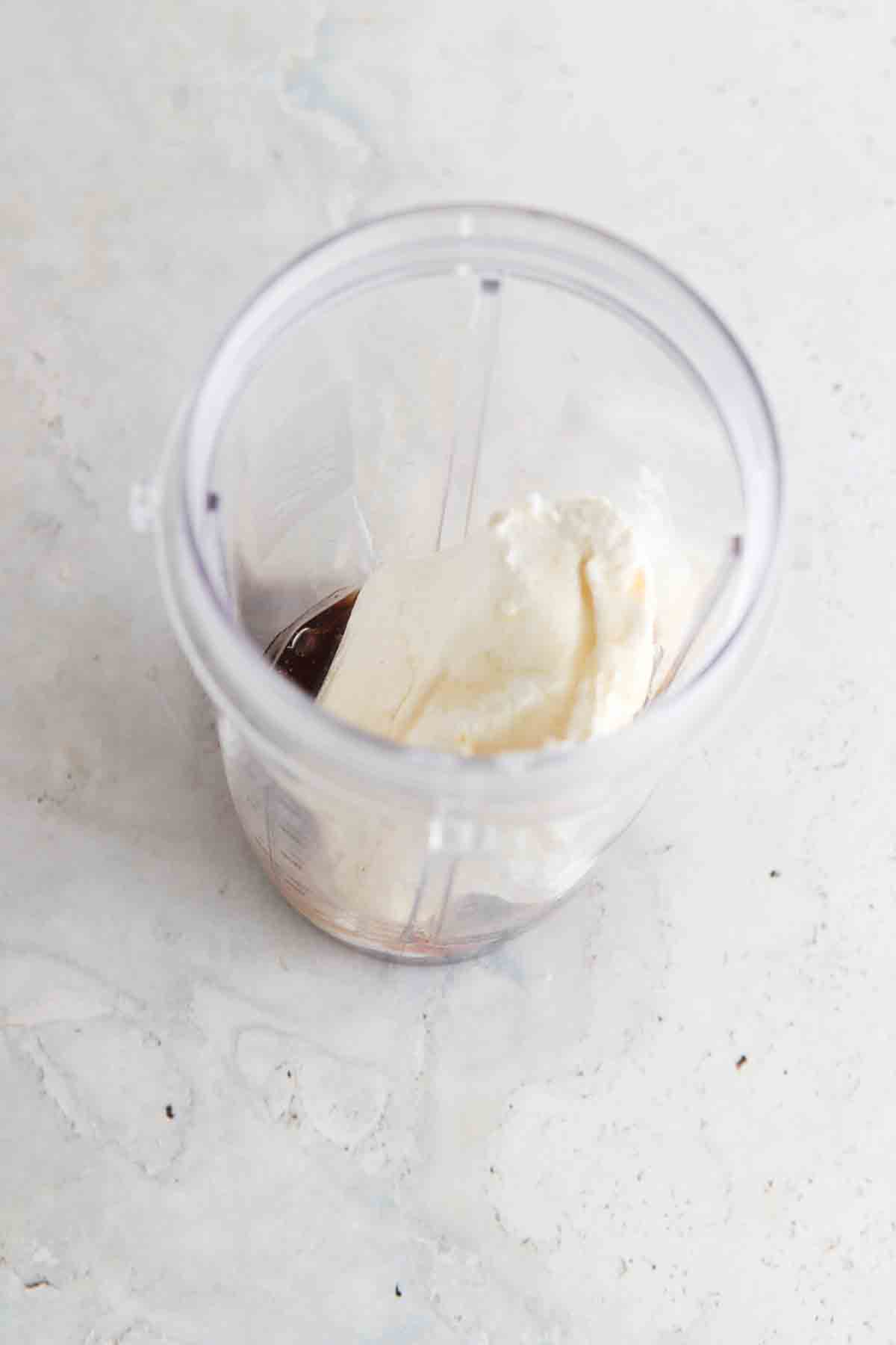 Cream cheese and maple syrup in a blender. 