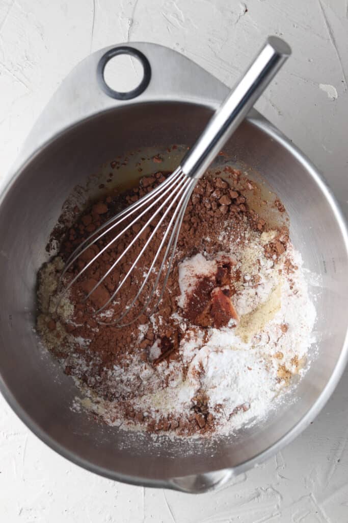 whole chocolate banana bread ingredients in a bowl