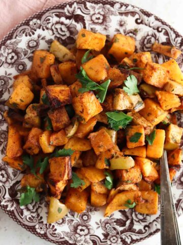 Butternut squash on a brown plate.