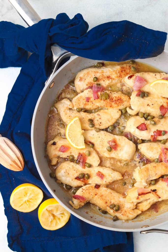 chicken piccata in a frying pan