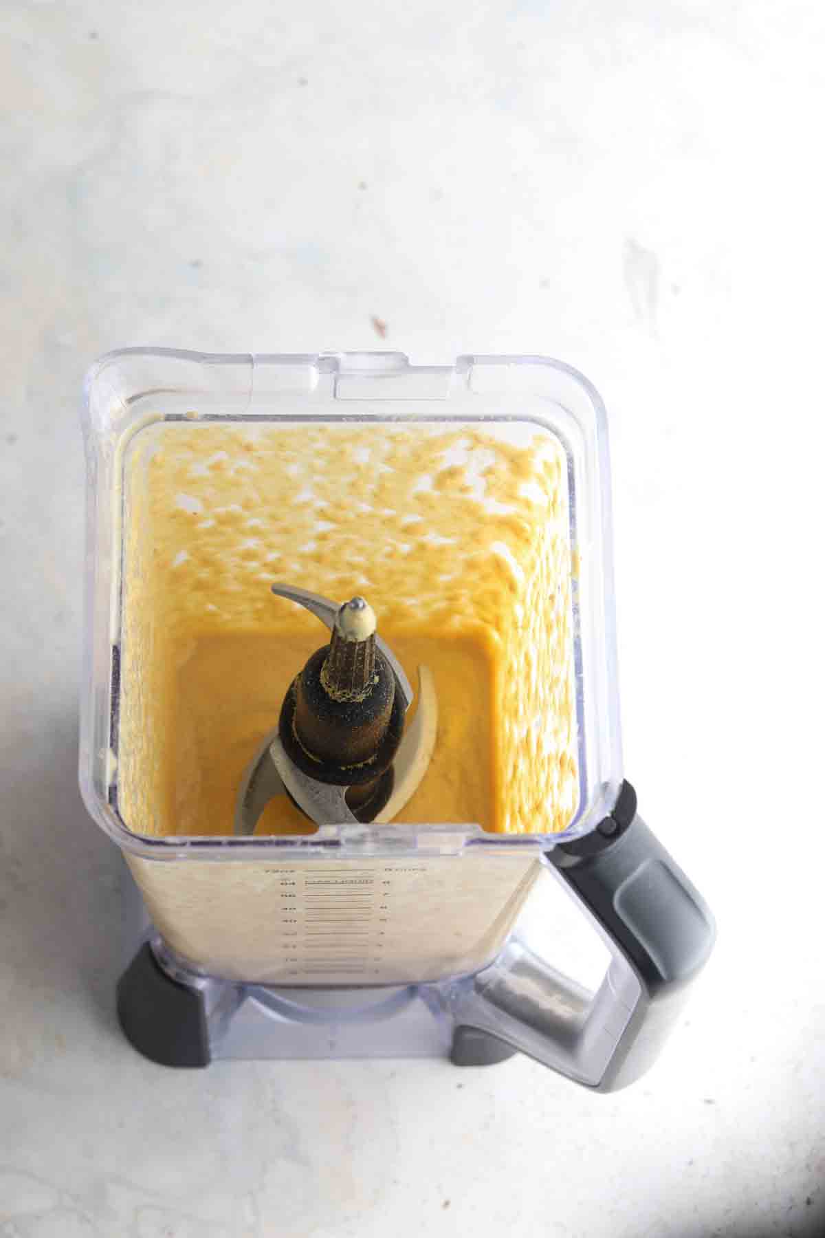 Cashew cheese ingredients in a blender. 