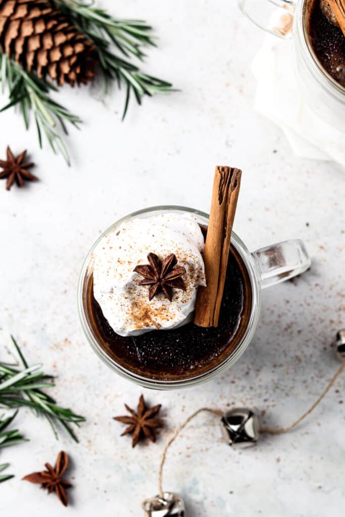 aip hot chocolate overhead shot with Christmas bells 