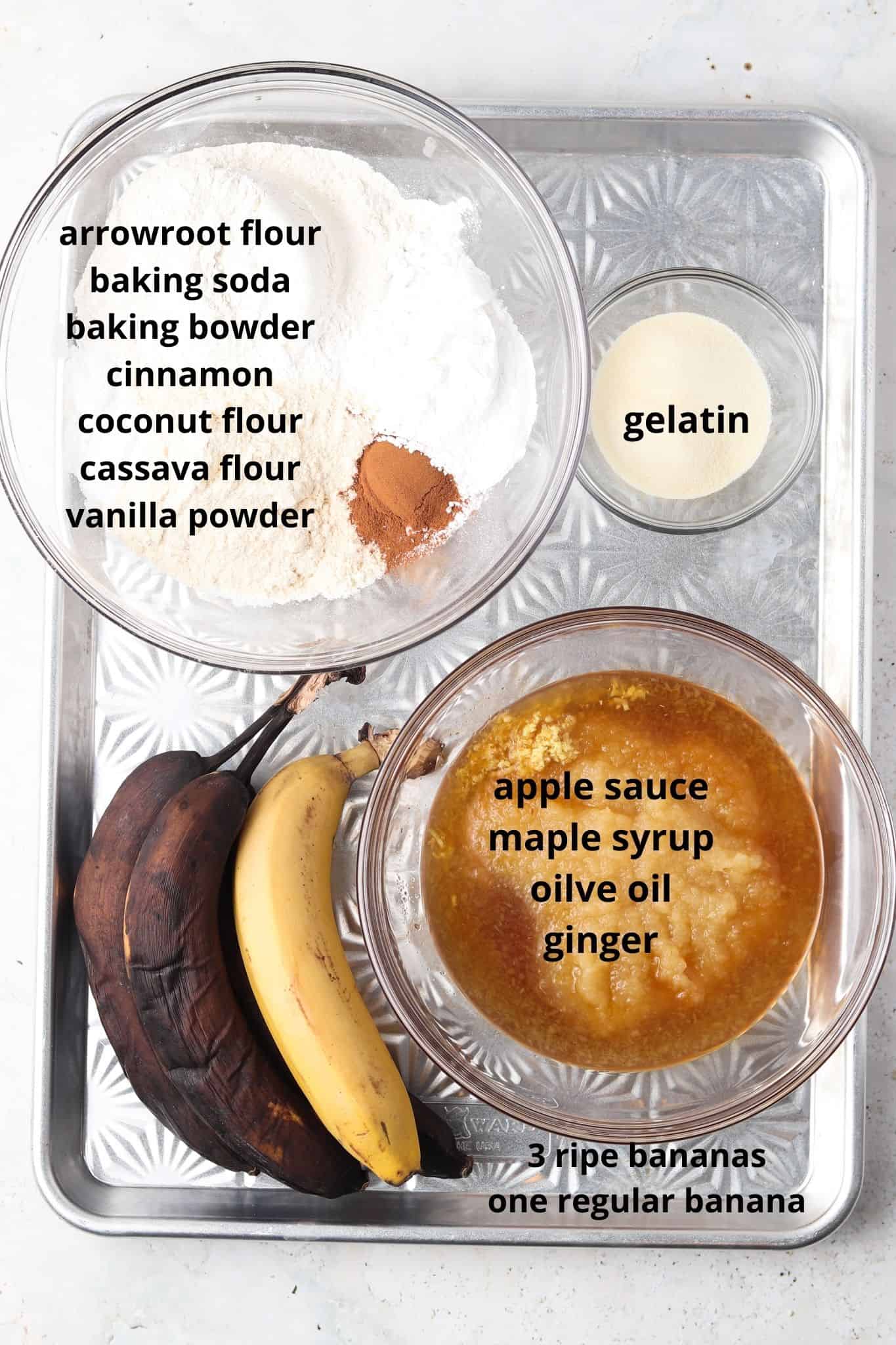 AIP Banana Bread ingredients in small glass bowls on a silver tray. 