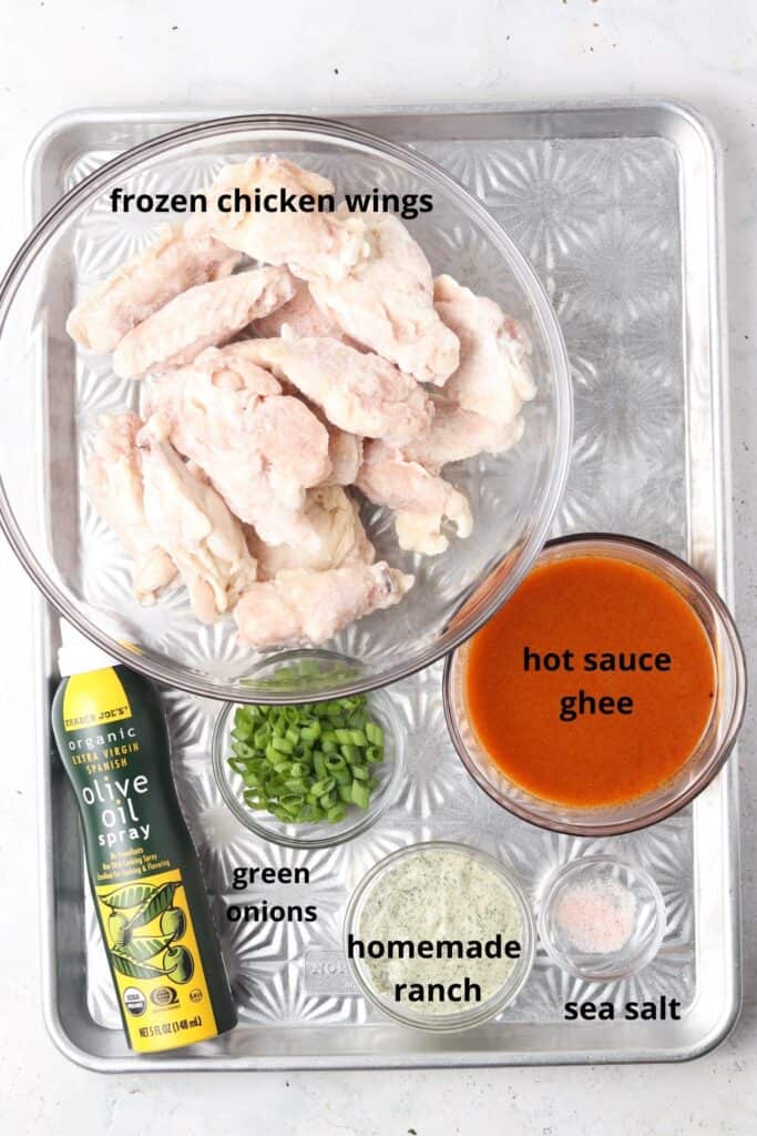 crispy buffalo chicken wings ingredients on a metal tray