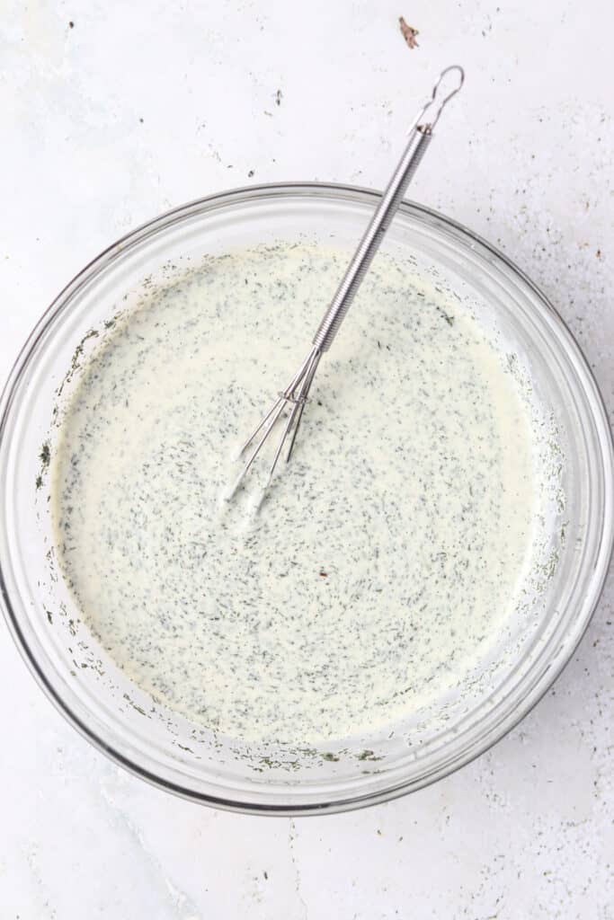 whole30 ranch dressing ingredients in a mixing bowl