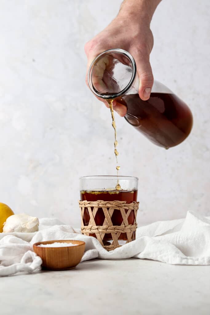 aip bone broth poured into a glass