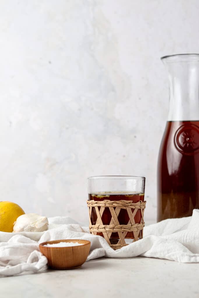 aip bone broth in a jar being poured into a glass