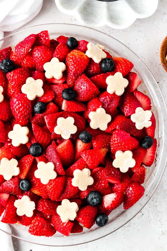 aip pie crust and berries close up in a pie dish