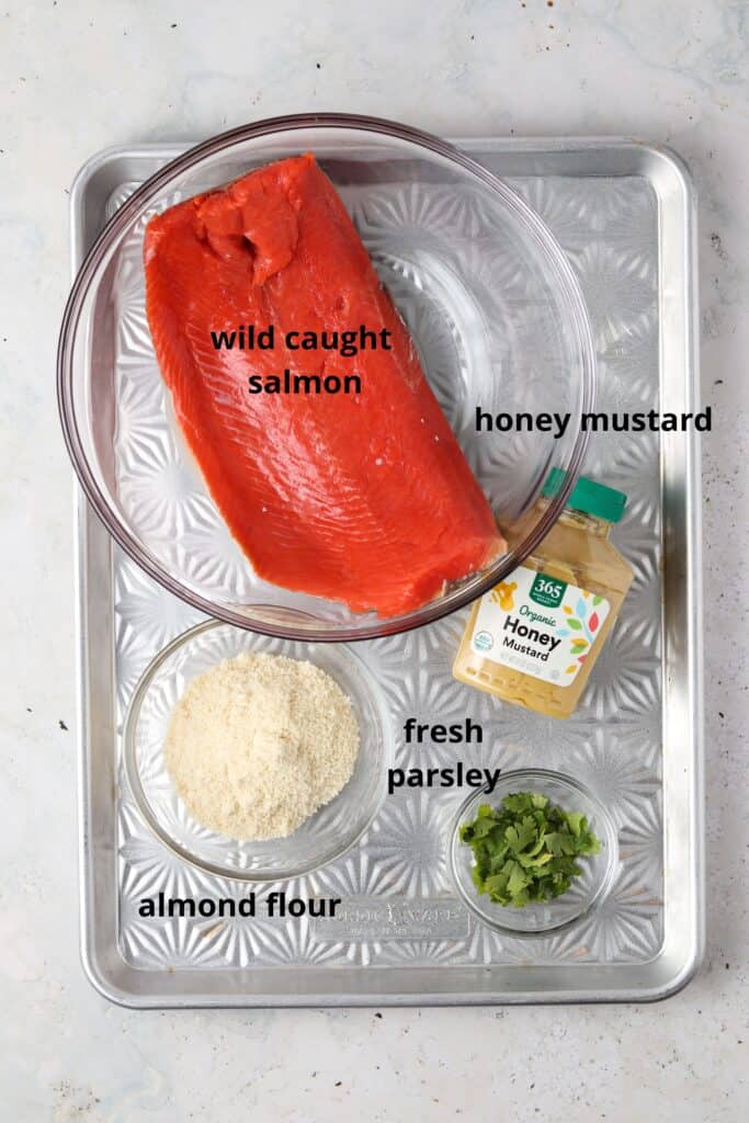 ingredients for herb crusted salmon on a metal tray