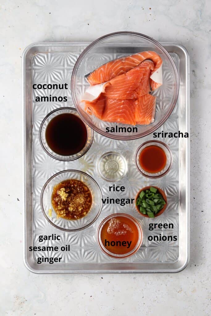 sriracha salmon ingredients on a metal tray