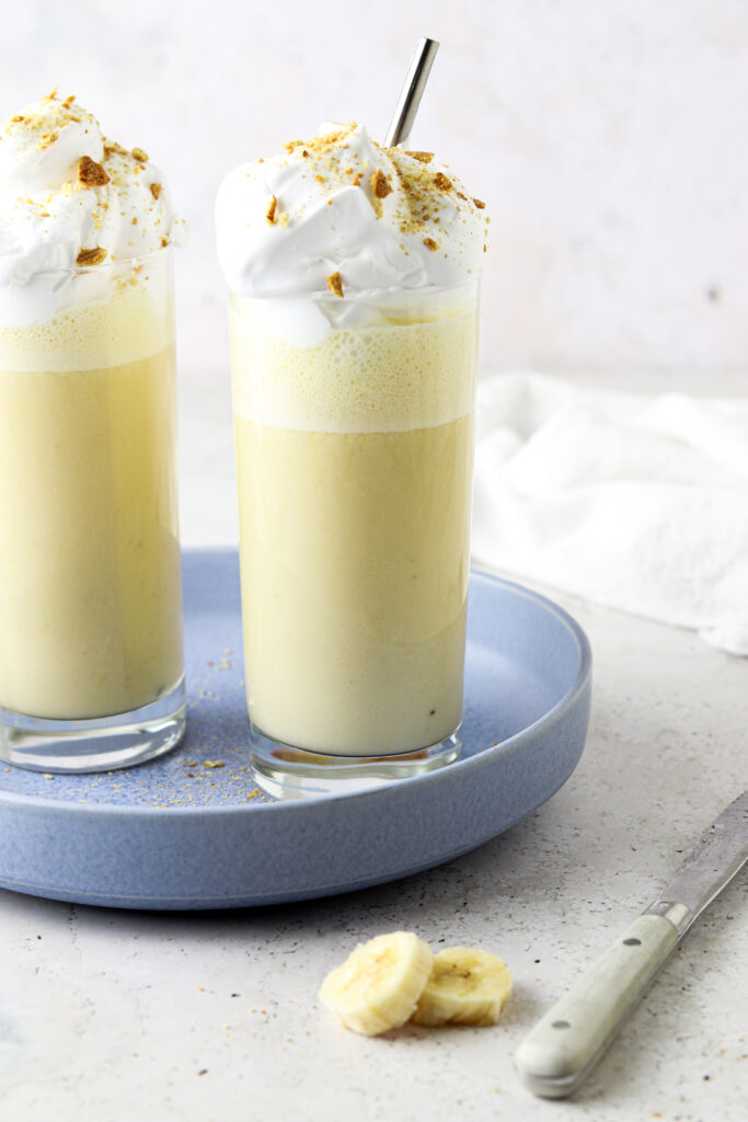 banana smoothie on a blue plate