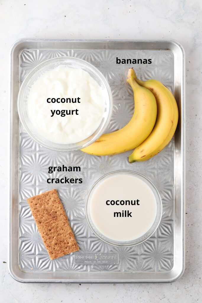 ingredients for banana cream smoothie on a tray