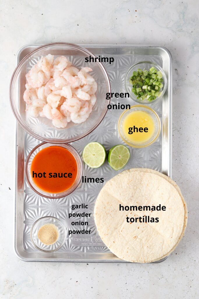 taco ingredients on a metal tray