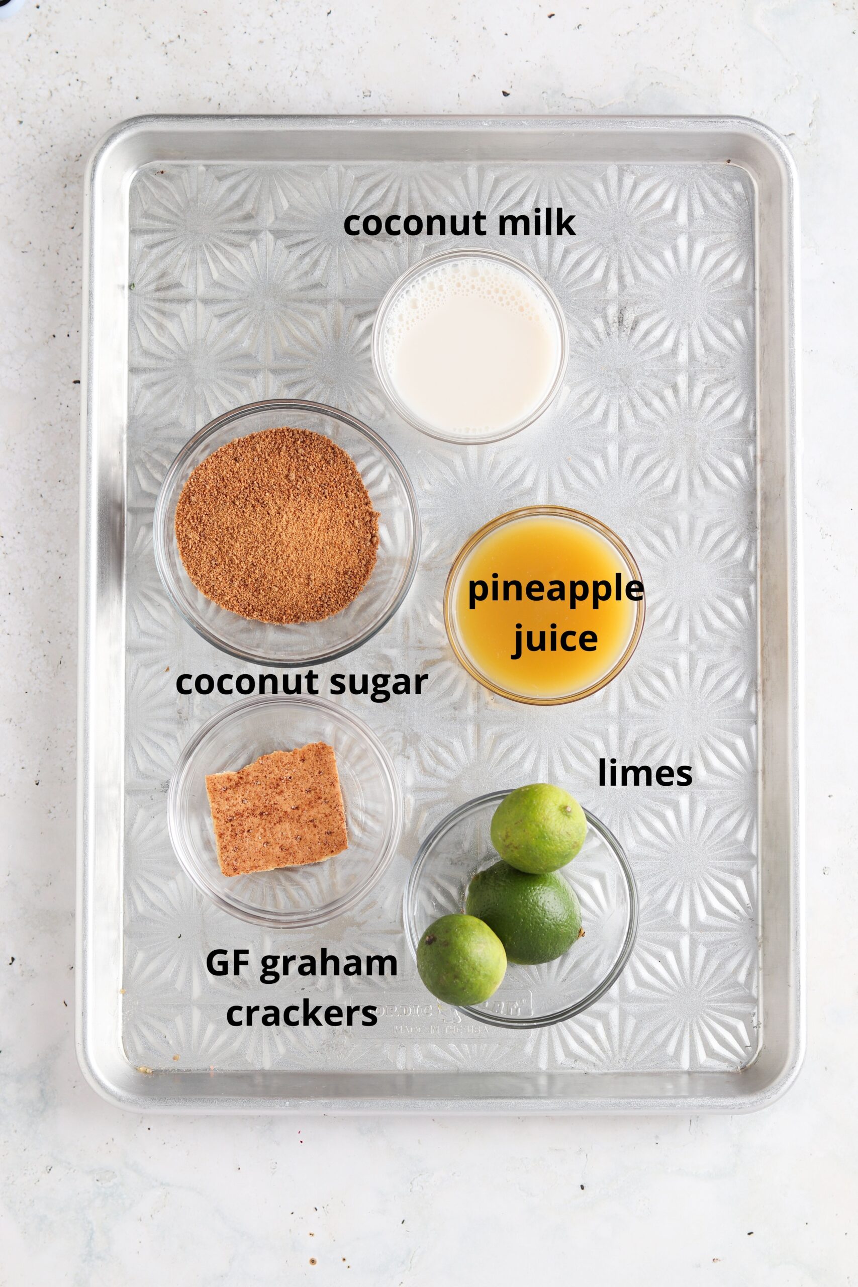 key lime pie mocktail ingredients on a tray