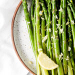 Lemon garlic asparagus on a serving dish.