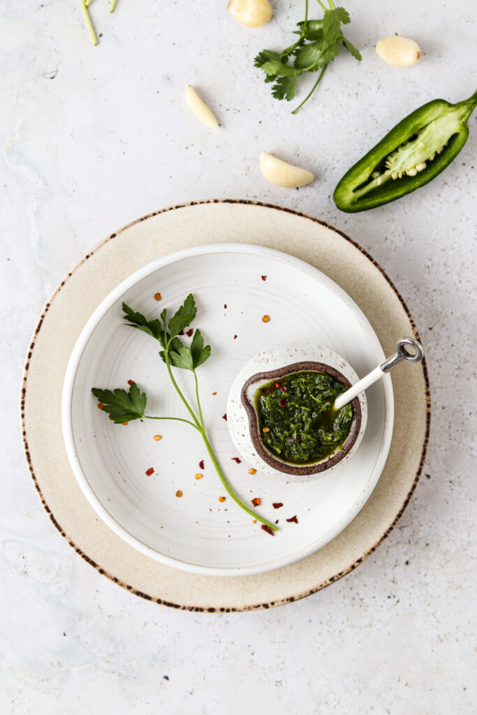 argentinean chimichurri in a bowl with a spoon