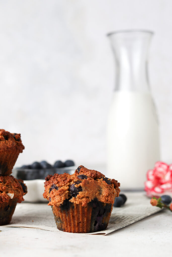 muffin with almond milk and red flower