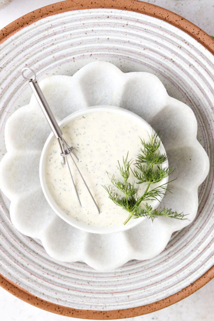 dill aioli for the whole30 salmon cakes in a bowl