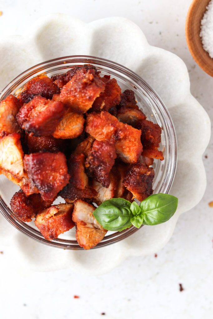 cubed grilled pork belly in a bowl