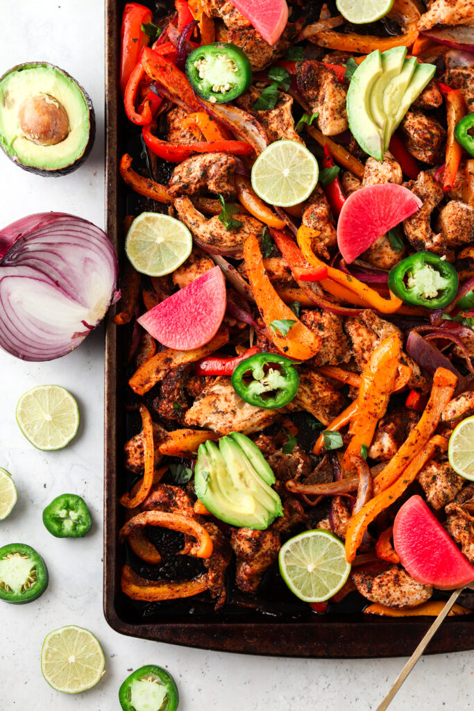 Sheet Pan Chicken Fajitas with lime wedges and jalapeño no slices 