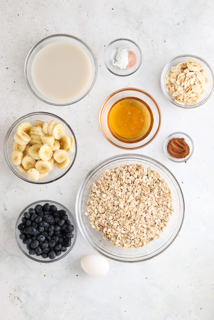 blueberry banana oatmeal bake ingredients in small bowls