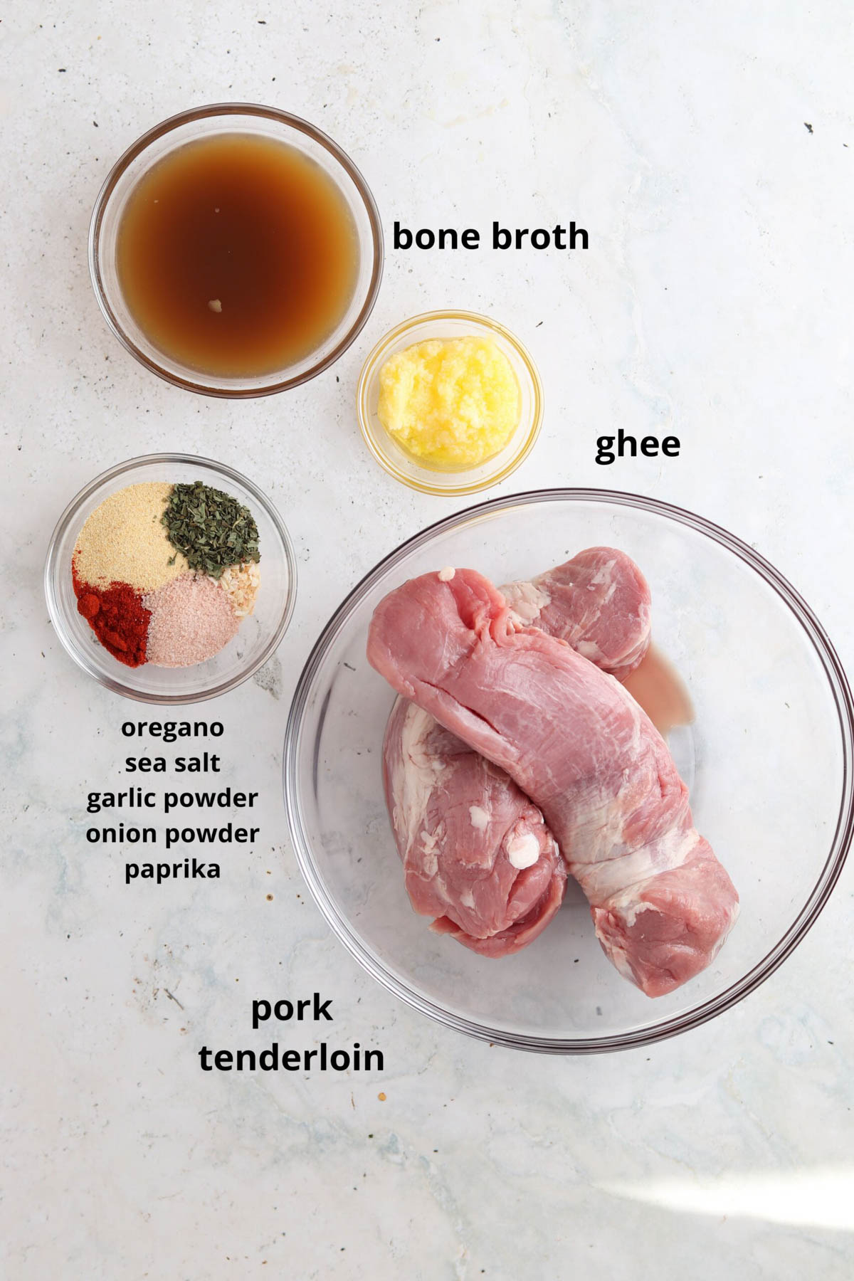 Braided pork tenderloin ingredients in small glass bows.