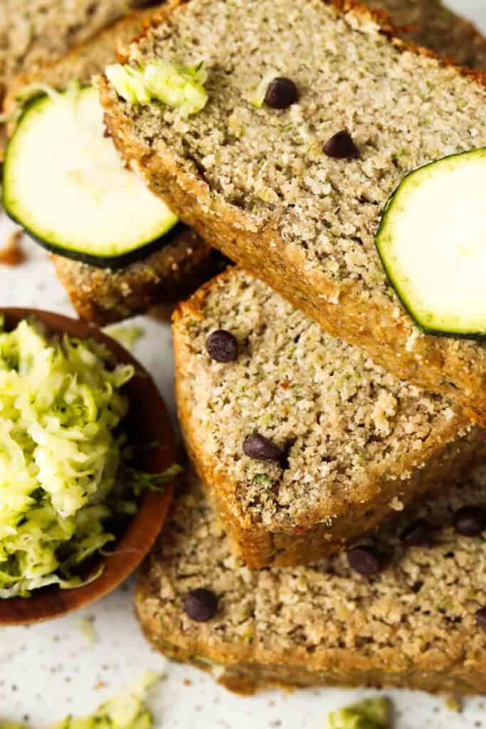 Zucchini bread on a platter with chocolate chips.