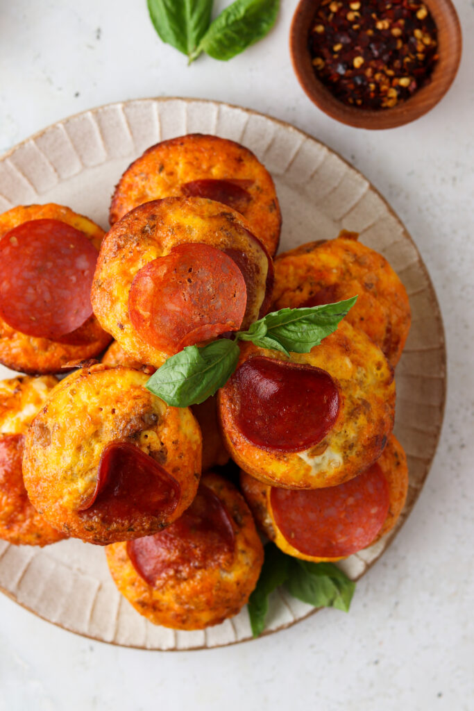 pizza egg breakfast muffins on a plate