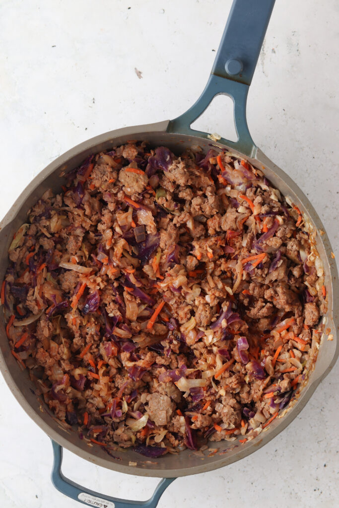 keto egg roll in a bowl in a skillet