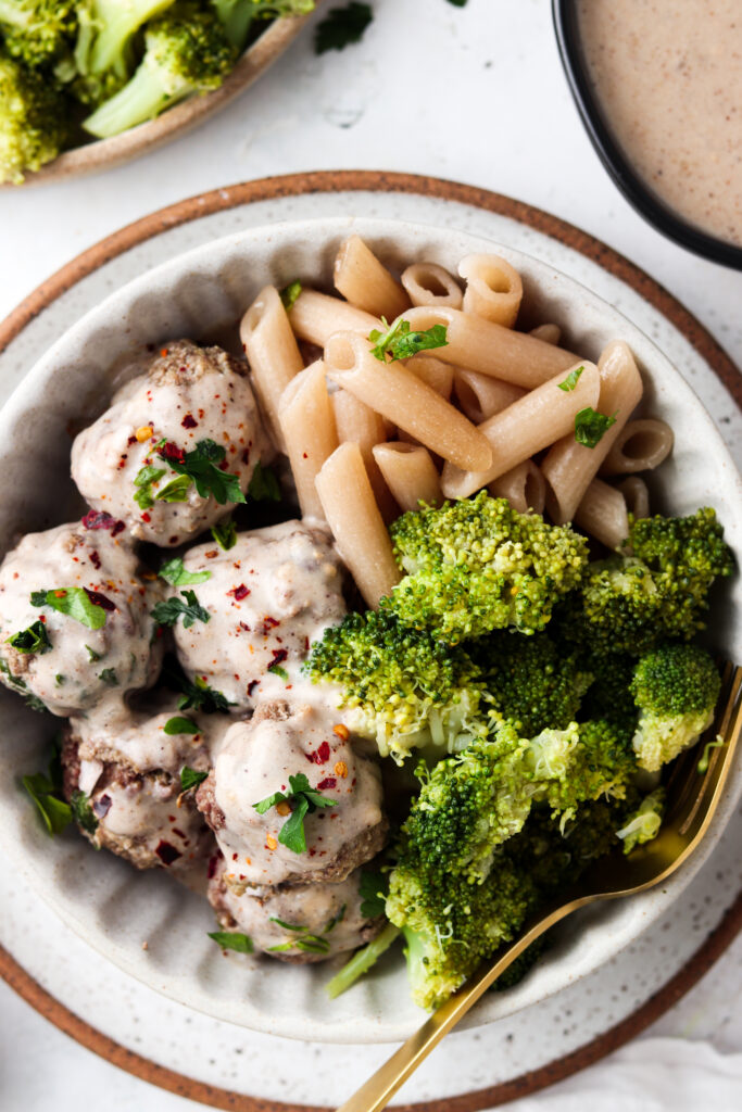 whole30 swedish meatballs in a bowl with broccoli