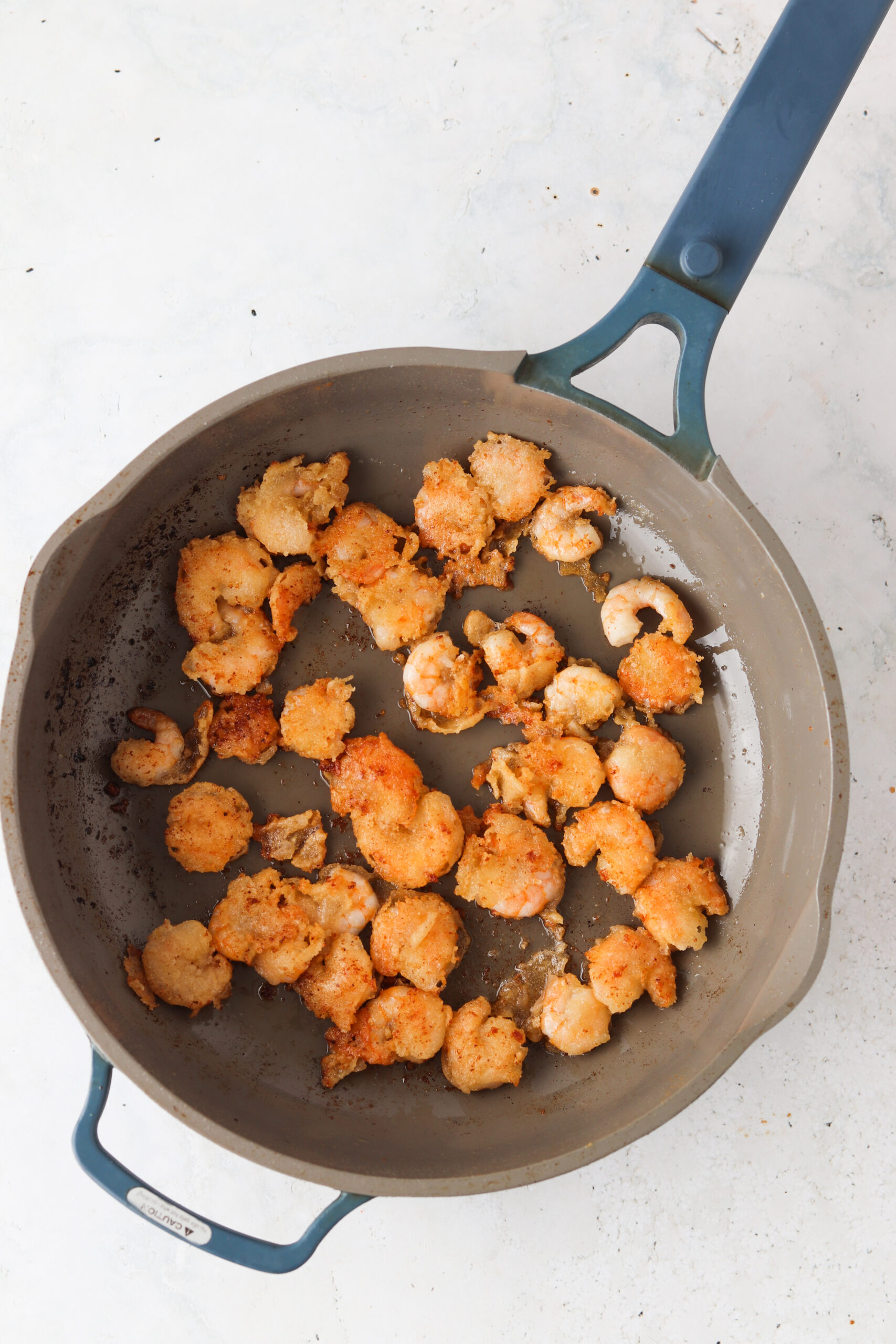 gluten free fried shrimp in a pan