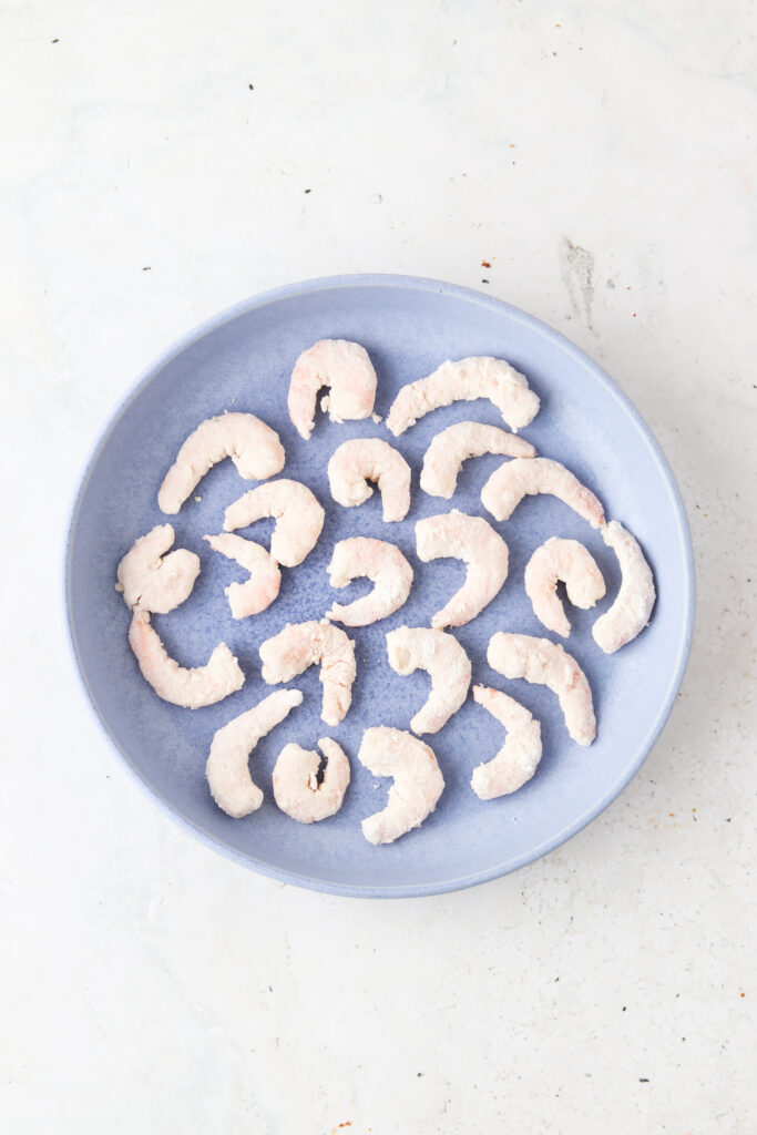 gluten free breaded shrimp on a blue plate