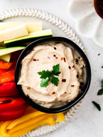 whole30 hummus in a bowl with vegetables